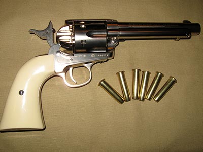 Colt Peacemaker with bullet magazines